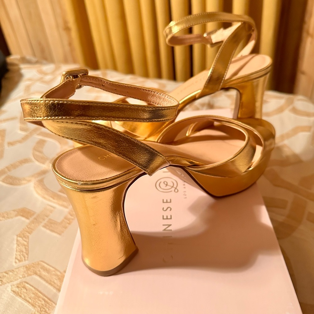 Beautiful gold heeled sandals.